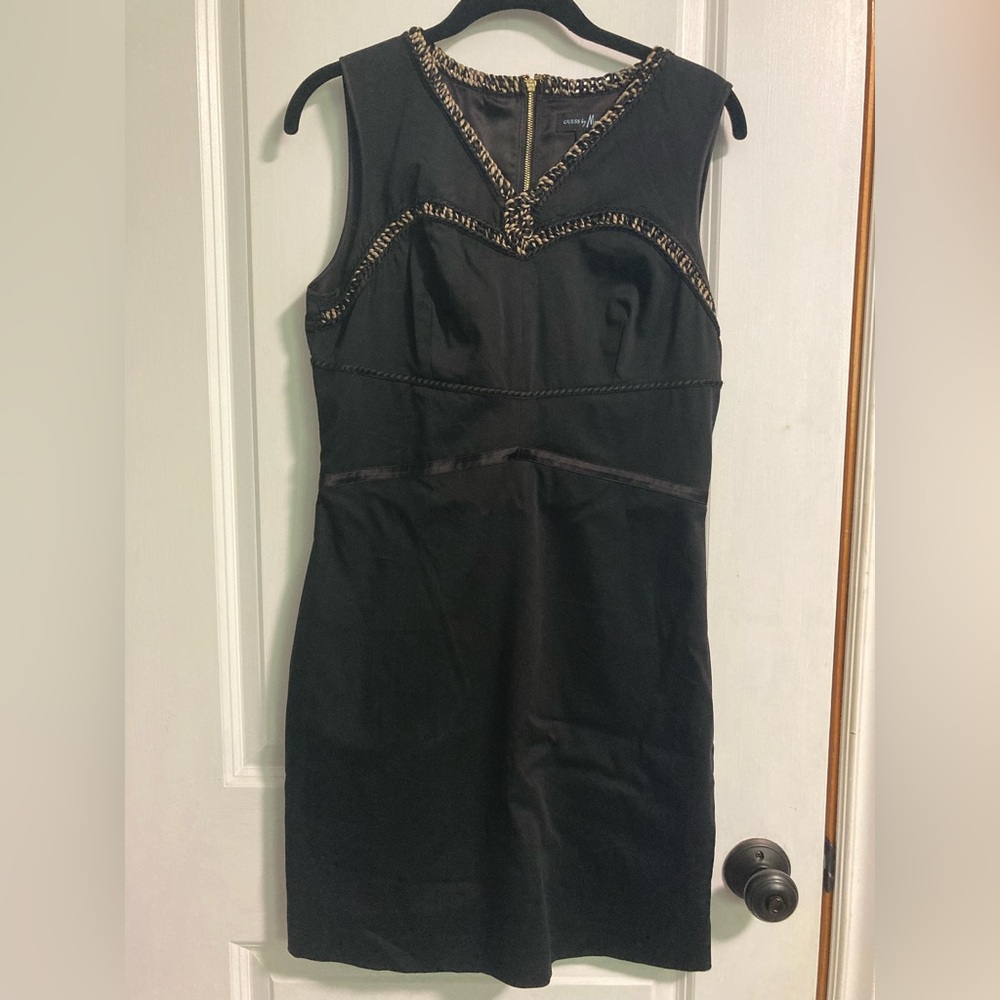 Black cocktail dress with leopard detail